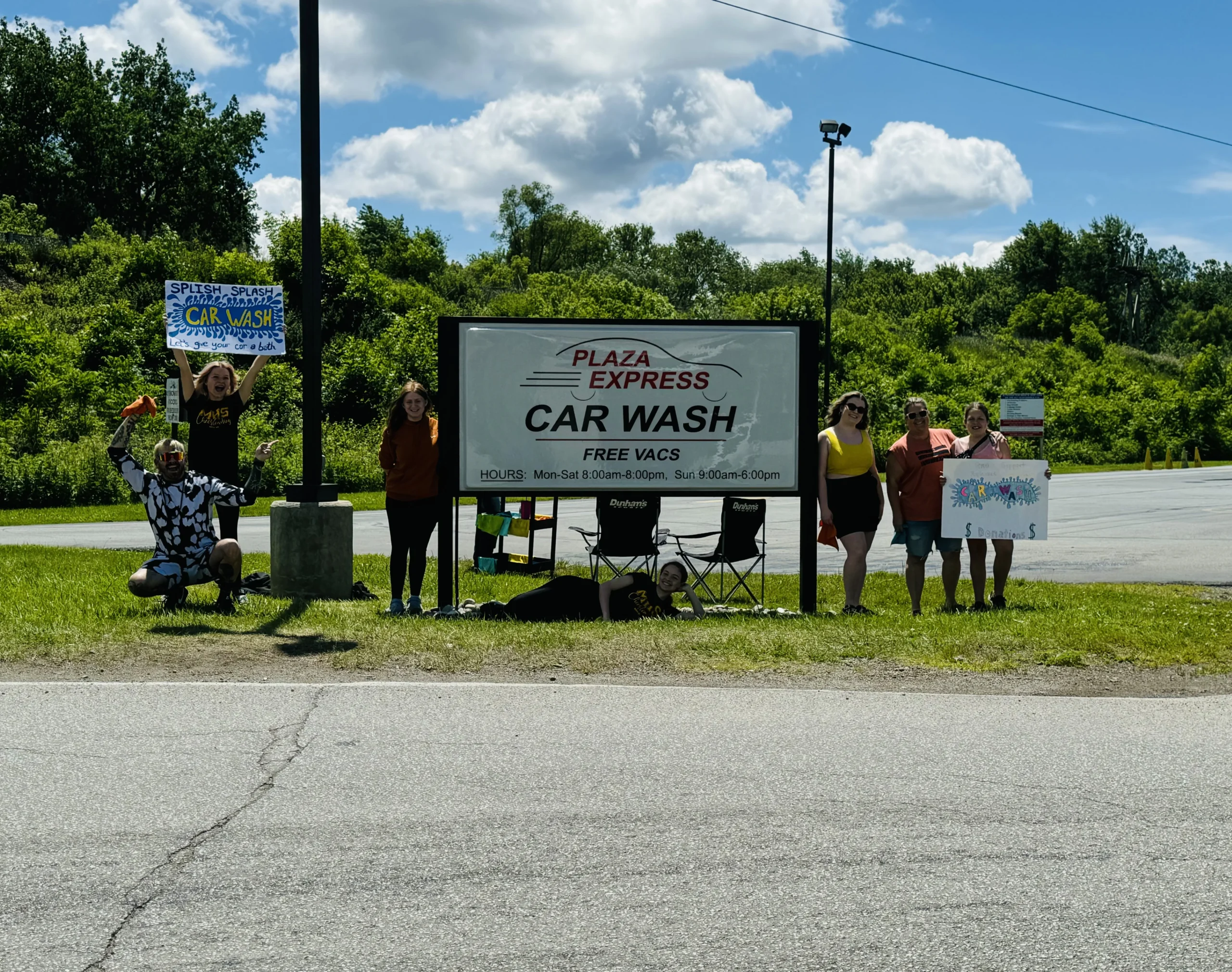 A group of people standing next to each other.